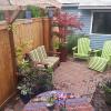 We removed an old rotting deck and fence and replaced it with an outdoor living room.